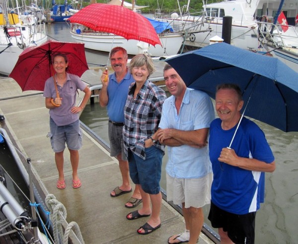 Our farewell committee at Shelter Bay Marina, braving the rain to give us a send off. Reta, Robin, Susie, Andy ( Who should have been on the boat!) and Gert.