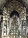 The churches in Portugal seem to have elaborate golden (real) decoration applied to wood carved altar pieces. The sheer scale is breath taking. Vast sums of money were spent on furnishing churches during Portugal