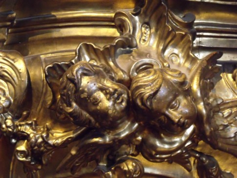 Gold decorated wood carved cherubs. A small sample of an enormous carving standing some eight-metres high.