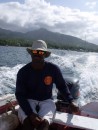 Martin, boat boy and guide en route to the snorkeling sites in Douglas Bay, Dominica.