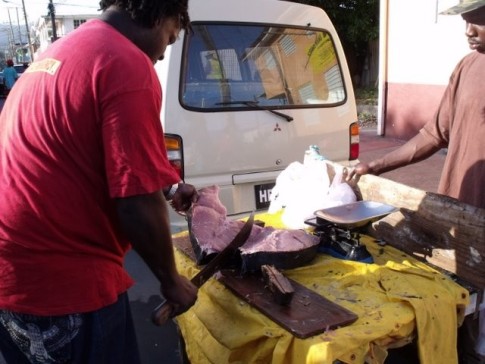Blue Marlin being "cut" with the ubiquitous machete. We got in just before the last of the large fish was all sold.