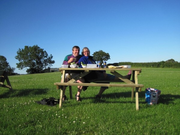 Andy & Sue enjoying a picnic evening meal at the campsite