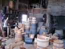 The cooperage. Wet barrels, dry barrels and barrel-style baskets. The most skilled coopers were those who made barrels for storing liquids: leaks not acceptable.