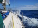 The afternoon following a night hove-to. Making fast progress towards Bermuda in big seas.