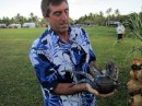 Andy is shown how to pick up the coconut crab with out loosing fingers!
