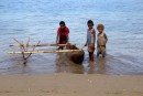 They start them young. The oldest boy said he built this canoe.