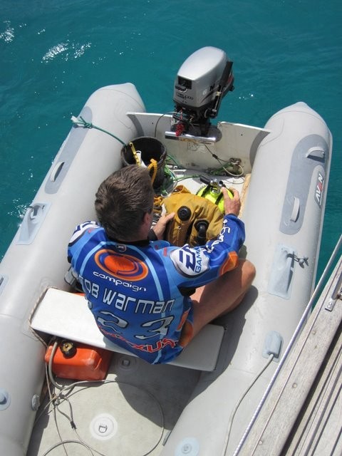 Andy gets ready to dive and clean the hull