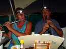 John and Sue providing "Sundowner Concert" aboard Spruce anchored at Falmouth Harbour - Antigua. The audience were the crews of Aleria (Alex & Daria), Rapau (Keith & Welly), Moonlight (Anne with John playing clarinet)