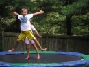 John and Caroline jumpng on the trampoline!.JPG