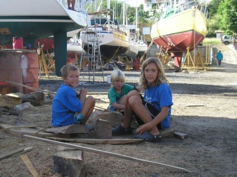 x The -boat yard rats- John, Francois and Daniel making wooden guns.JPG
