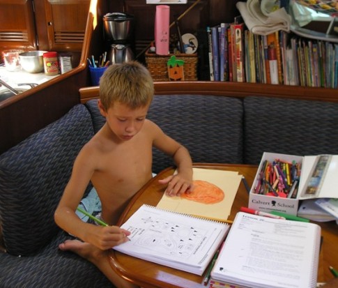f John in school working on his Pirate Map in Geography.JPG