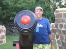b My dad is next to a cannon at Fort Rodney.JPG