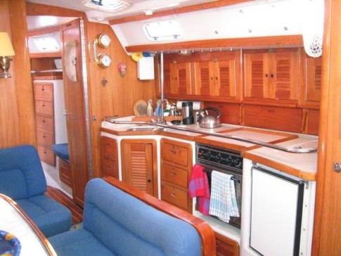 Lots of room for cooking great meals.  Notice the stainless steel grab rail running the length of the galley.  It