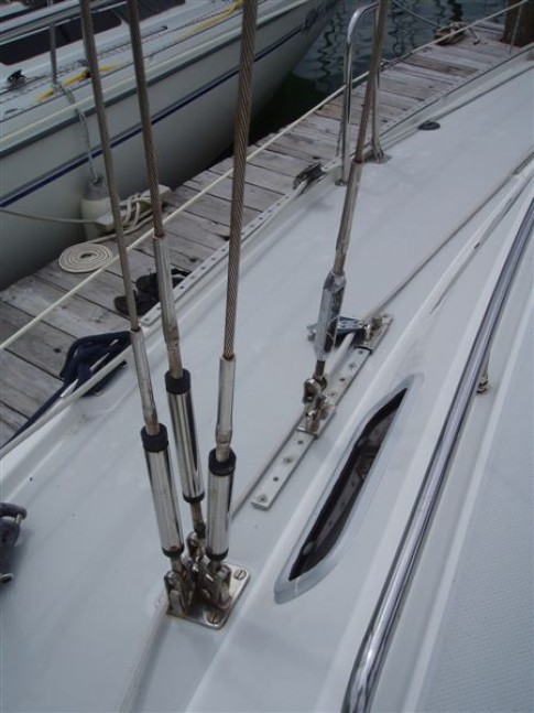 The normal standing rigging for a Catalina 42 includes upper, intermediate, and lower shrouds.  Salacia has had running backs, a