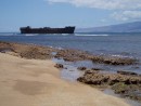 This is Shipwreck beach on the Windward side of the island.  This ship is from World war II.  The government tried to sink it bu