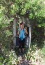 a very overgrown, but working, telephone booth at Whaletown, Cortes I