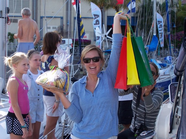 Britt holding our fruit basket and shopping gift bags from the Tourism Board in Mauritius