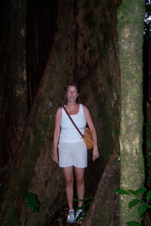 Janet between the roots of one of the trees