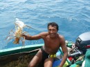 A Kuna fisherman selling his catch