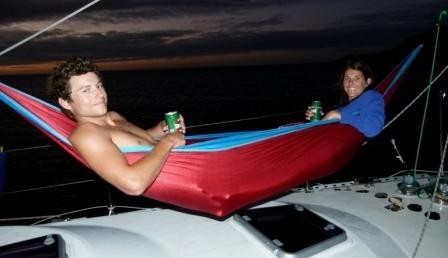 The end of another tough day aboard the yacht  -  Bri & Linds test out the capacity of our lightweight hammock.