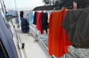 Drying out a lot of wet clothes at the end of the day.  How did so many clothes get so wet?  That