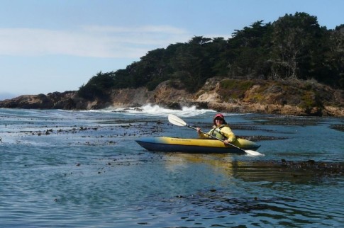 Kayaking near the big surf break at the entrance to the bay.  Swells rolled through the anchorage so we set a stern anchor to keep the boat pointed into them  -  less rock n rolling!