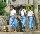 Students walk through Neiafu after school.  many from the out islands live in residence in town and go home on weekends.