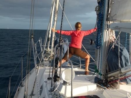 Beth enjoying yoga on the foredeck as we depart from Nuku