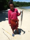 Dominique from the village of Matamaka with octopus caught on the reef.  Norm ate some for lunch!