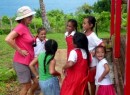 Beth plays a dancing game with the girls at the school in Nuapapu.