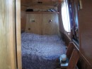 Featuring ample drawers, closet space and a dressing table, the forward stateroom was laid out around a king-sized berth.