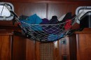 This is a mini hammock that hangs between the two hanging cloths lockers