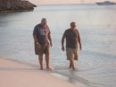 Rick and Bud walk the beach at Hawksbill Cay.