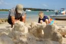 Digging: Grandpa and Nolan at the beach by Marine Stadium.  They enjoy the "best sand ever" according to Nolan!