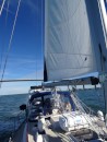 Sailing in Tampa Bay with the Sunshine Skyway in the background.