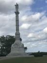 Yorktown Victory Monument : Symbol to the American and French victory at Yorktown on Oct. 19, 1781. There are thirteen female figures hand in hand to denote the thirteen colonies. Beneath their feet is the inscription "one country, one constitution, one destiny."