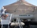 Captain Brian doing the finishing touches to the boat cover