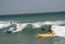 Brad and Monte catching a wave
