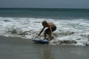 Zach trying to surf a boogie board