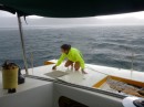 Scrubbing the decks is easier in the rain - no rinsing required!