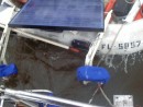 Lucky the solar panel landed on the dinghy instead of the water.