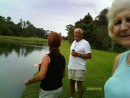 Mitch and Rose feeding the turtles.