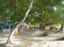 This is the beach at Sosua, nicely shaded, but lined on the inland side by stall after stall of merchants selling cheap wares.