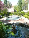 The Calhoun home offered this beautiful garden enhanced with spraying water.
