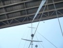 Here we are just starting to pass under the Wilkerson bridge.  The VHF antenna went clickety-clack on the cross panels throughout the width of it, better than the mast not being able to go clickety-clack.