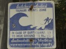 These signs are everywhere in Thailand along with klaxon warning towers. 