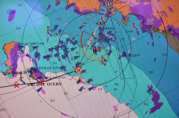 Our chart plotter at the approach to the Panama Canal entrance, each triangle represents one of those big cargo ships