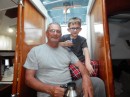 Cameron and Grandpa having breakfast on the boat.