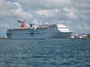 The Carnival Ecstasy as it departs Key West. Note the Coast Guard escort.