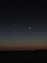 New moon with Mars and Jupiter in conjunction.